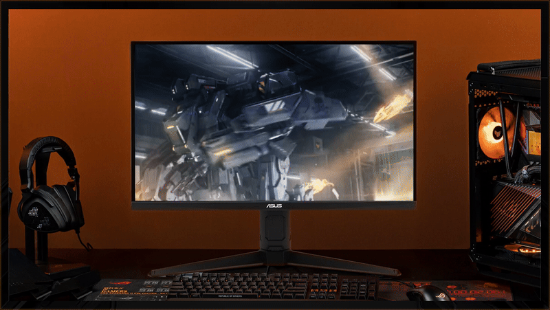 A VG279QML5A monitor centered in frame, with a keyboard positioned in front, headphones to the left, and a computer tower to the right.