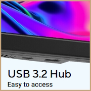 A close-up of the bottom bezel of a monitor showing a USB 3.2 hub with vibrant, swirling colors on screen.